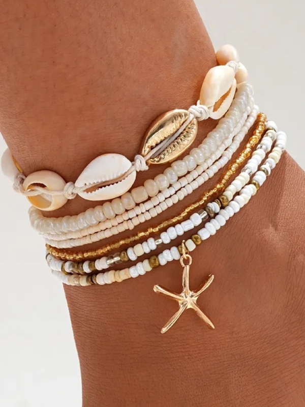 Chaîne de Cheville Multirangs Coquillages et Étoile de Mer Dorée – Style Bohème Chic