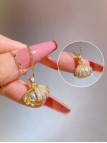 Collier Coquillage Doré avec Perle – Pendentif Ouvrant Élégant