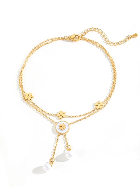 Chaîne de cheville dorée – Trèfles porte-bonheur et perles blanches