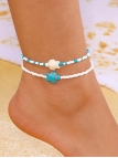 Duo de chaînes de cheville perles turquoise – Motifs tortues protectrices