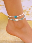 Duo de chaînes de cheville perles blanches – Étoile de mer & tortue