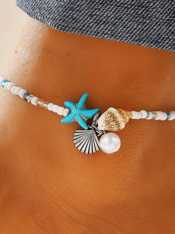 Chaîne de cheville perles et breloques – Étoile de mer, coquillage & perle