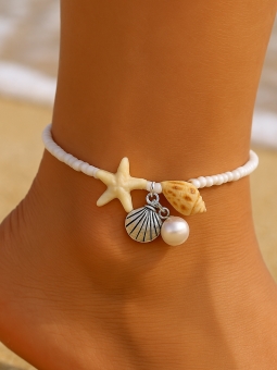 Chaîne de cheville blanche – Étoile de mer, coquillage & perle nacrée