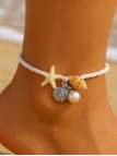 Chaîne de cheville blanche – Étoile de mer, coquillage & perle nacrée