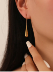 copy ofcopy ofcopy ofBoucles d’Oreilles Martelées Doré en Acier Inoxydable – Design Organique Élégant